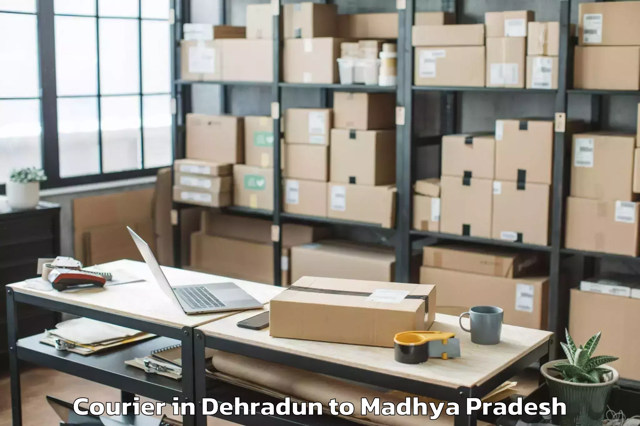 Easy Dehradun to Sardarpur Courier Booking